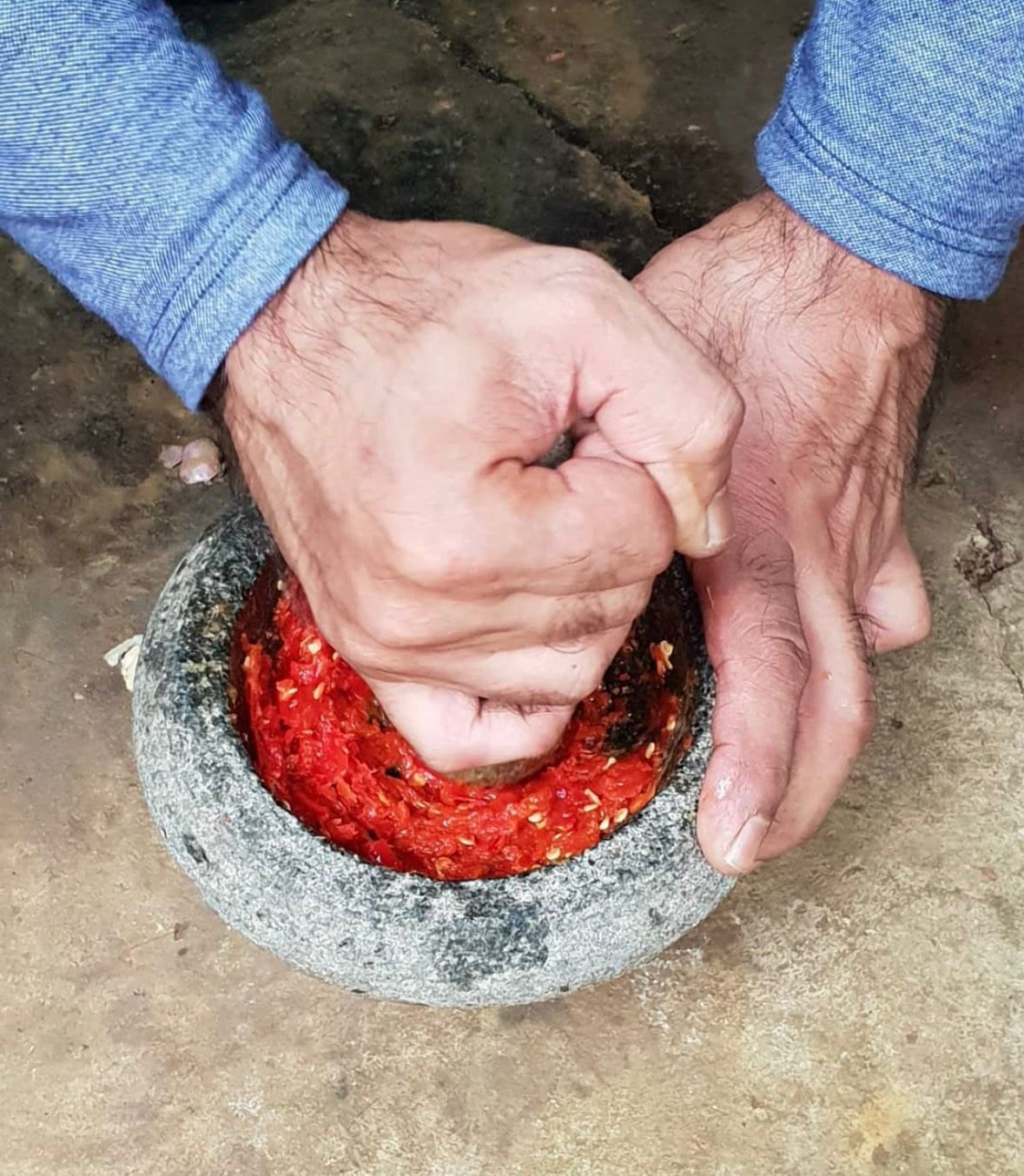 Team cooking together at the kampung
